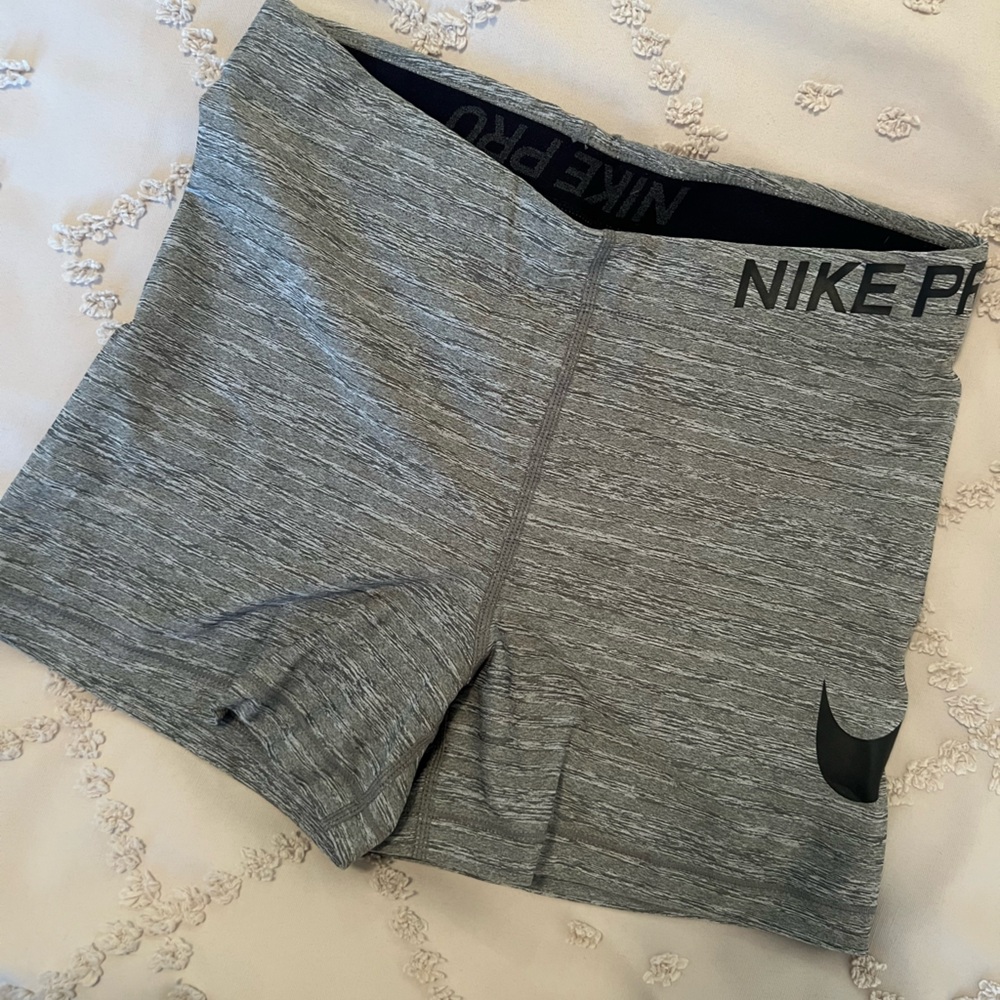 Nike Gray Athletic Shorts with Compression Fit.